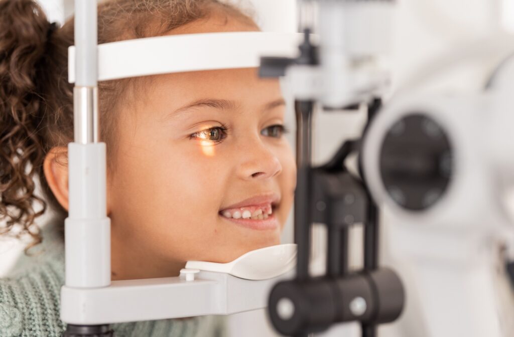 A little girl undergoes an eye exam.