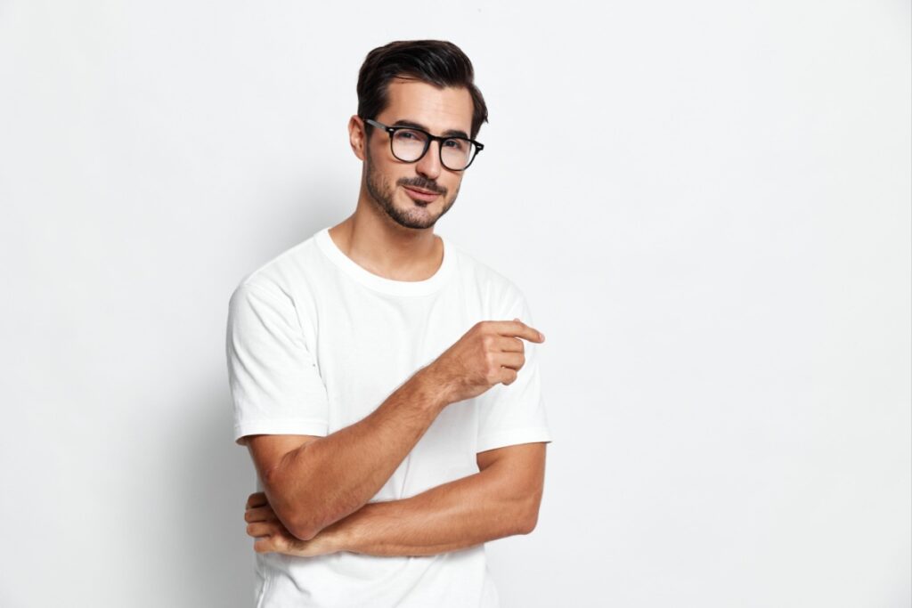 man wearing white shirt and fashionable glasses